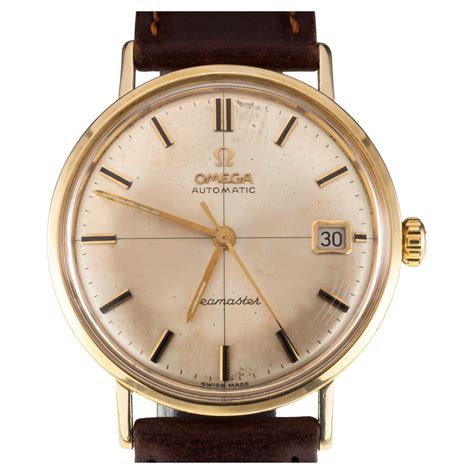 14k gold omega men's watch.